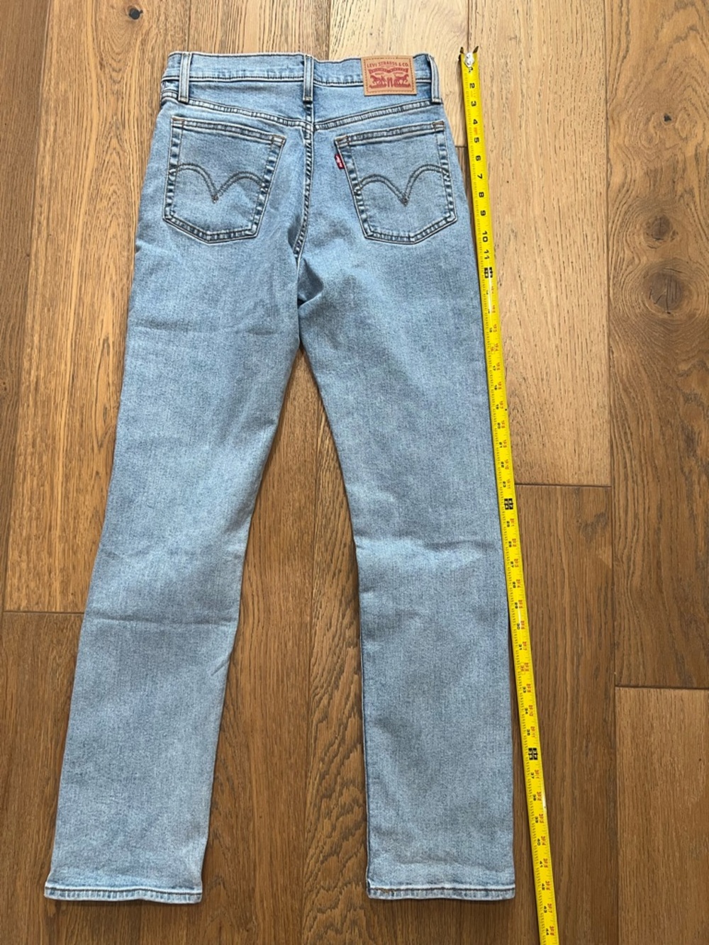 Levi's Women's Light Wash Straight Leg Jeans - Back Pocket Detail